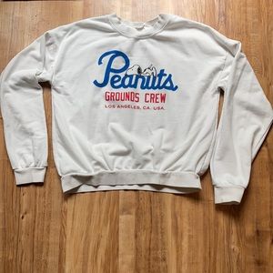 A white peanut sweatshirt.